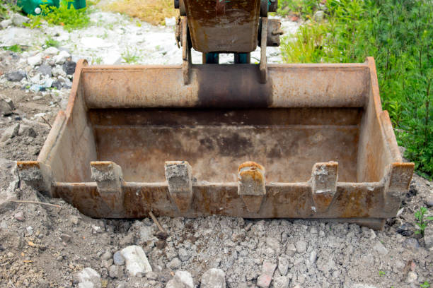 Old scraped excavator bucket
